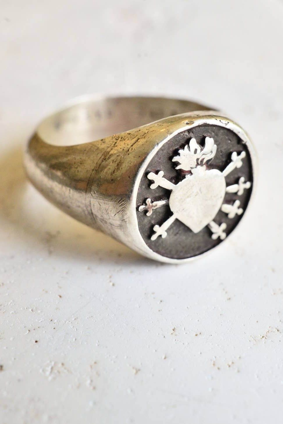 Montestruque seven sorrows heart signet ring. Shop Montestruque jewelry today. Featuring handcrafted jewelry, historic jewelry styles, Sustainable Practices and a love of nature, shop medieval themed jewelry for men and women. Coin necklaces for women. Signet rings for men. Medieval jewelry for women. Medieval jewelry for men. Zodiac jewelry for women. Magic jewelry. Fantasy jewelry. Nature jewelry for women. Moon and stars jewelry. Unisex jewelry.