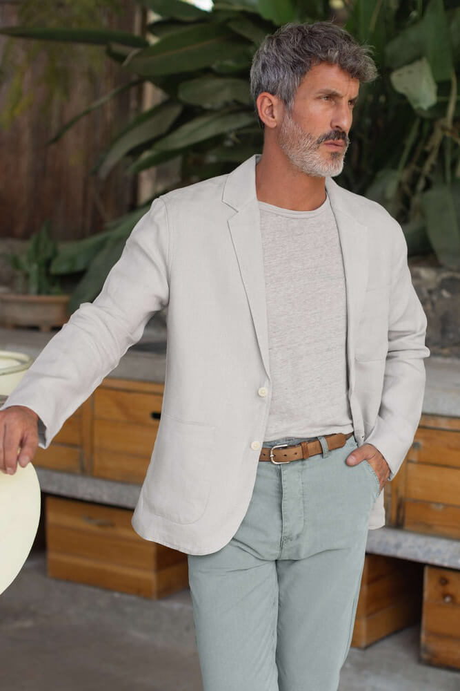 Man wearing the Alex Crane Alta blazer in bone