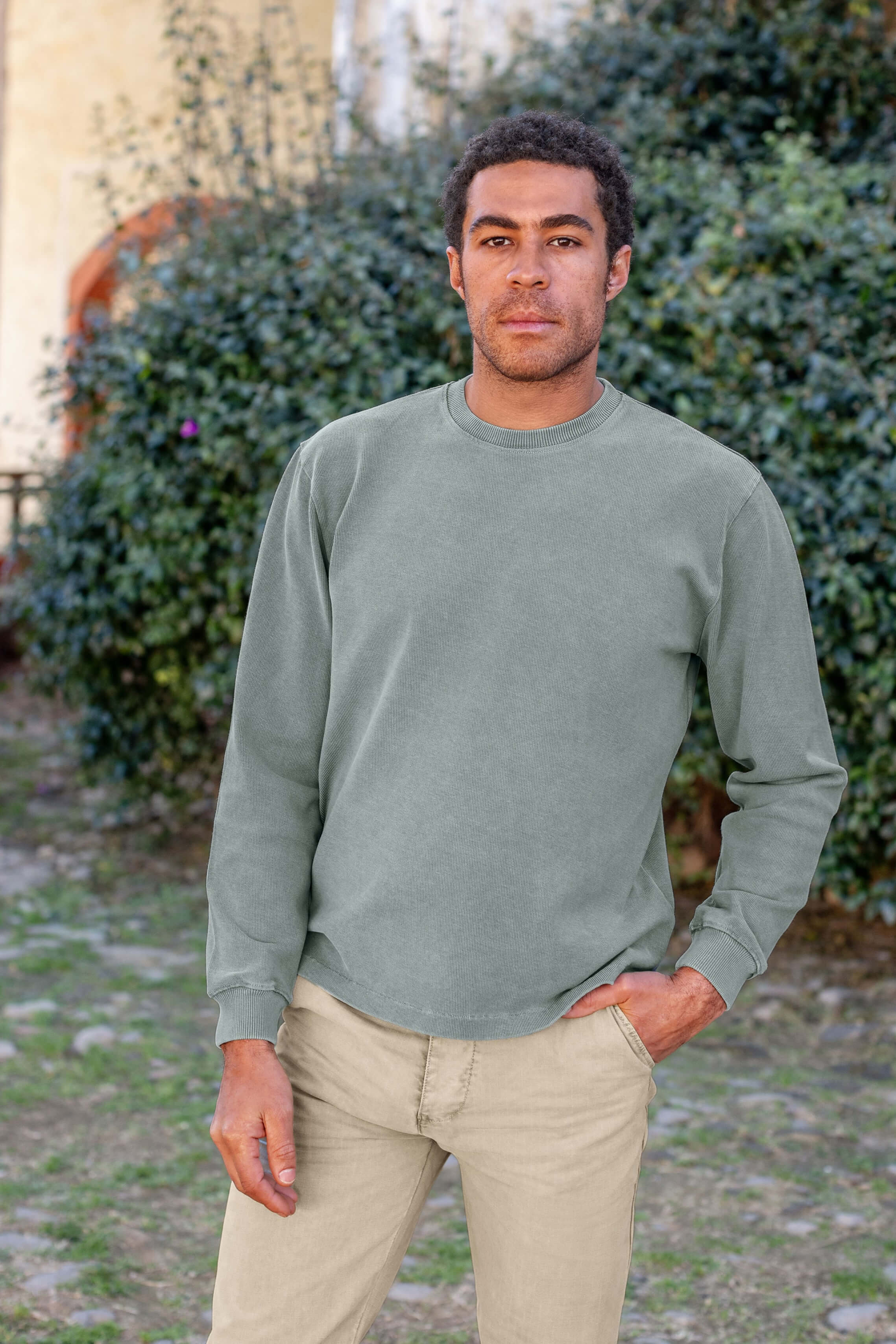 Man wearing Alex Crane Caza Crewneck in jade