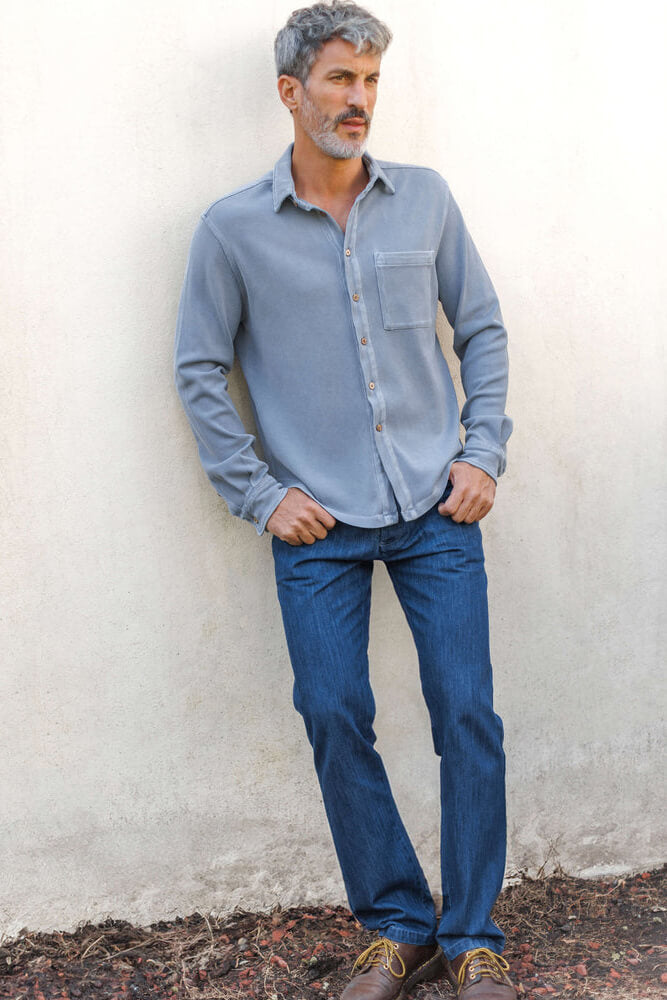 Man wearing the Alex Crane denim cham pants in indigo
