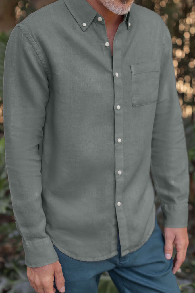 Man wearing the Alex Crane Playa Shirt in jade