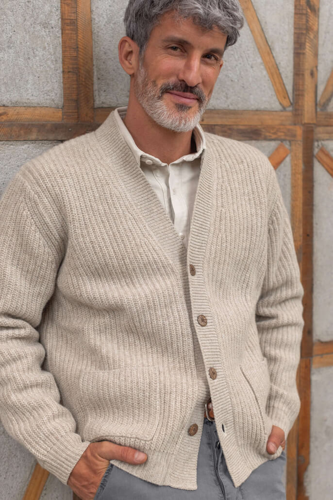 Man wearing the Alex Crane Vale Cardigan in bone