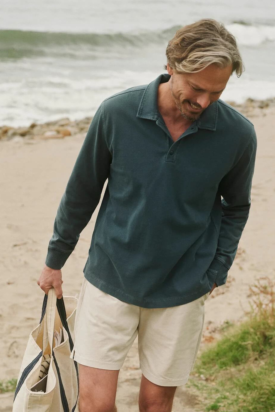 Man wearing the Alex Crane Feather weight Caza Knit Shorts in Cream