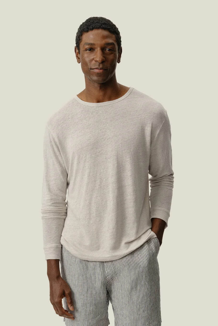 Man wearing the Alex Crane Long Sleeve Sun Tee in Bone