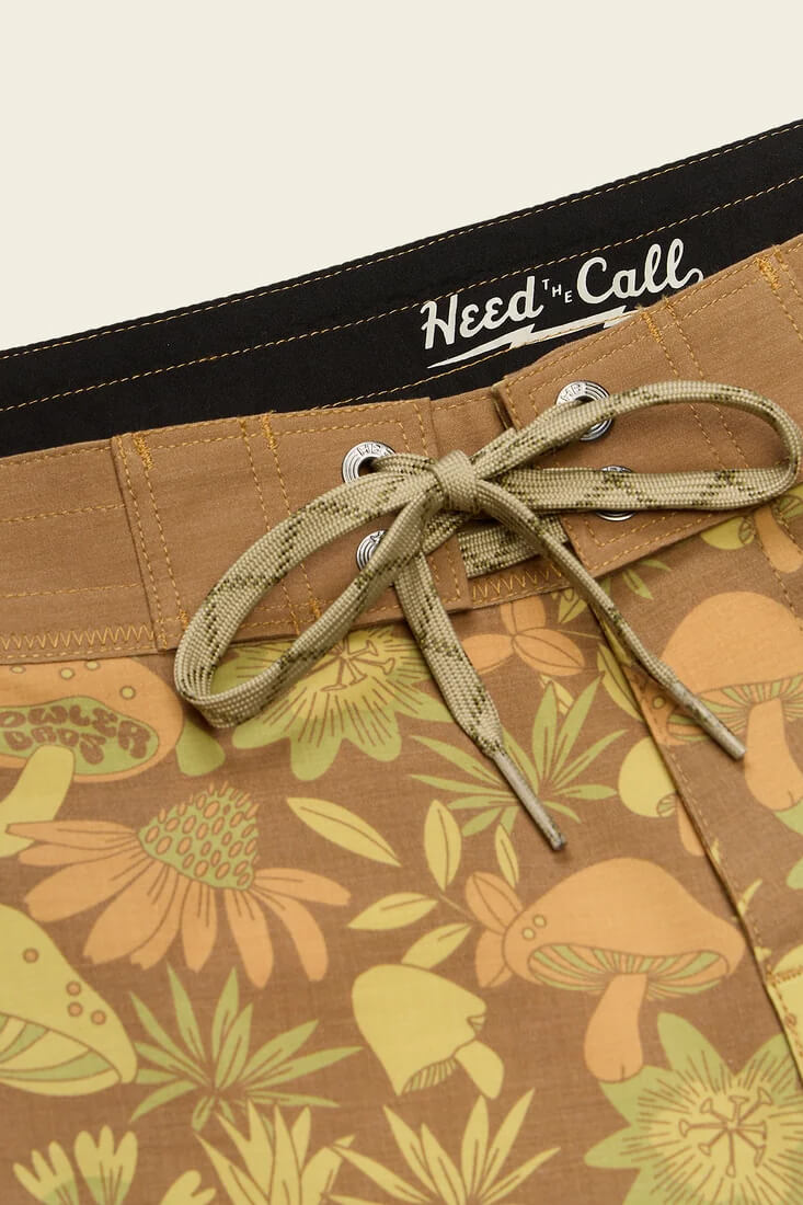 Howler Brothers Bruja men's boardshorts with drawstring waist, draining front pockets and scalloped leg openings.
