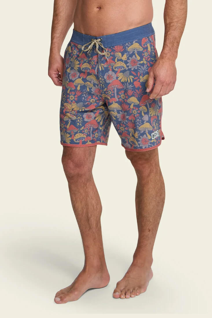 Howler Brothers Bruja men's boardshorts with drawstring waist, draining front pockets and scalloped leg openings