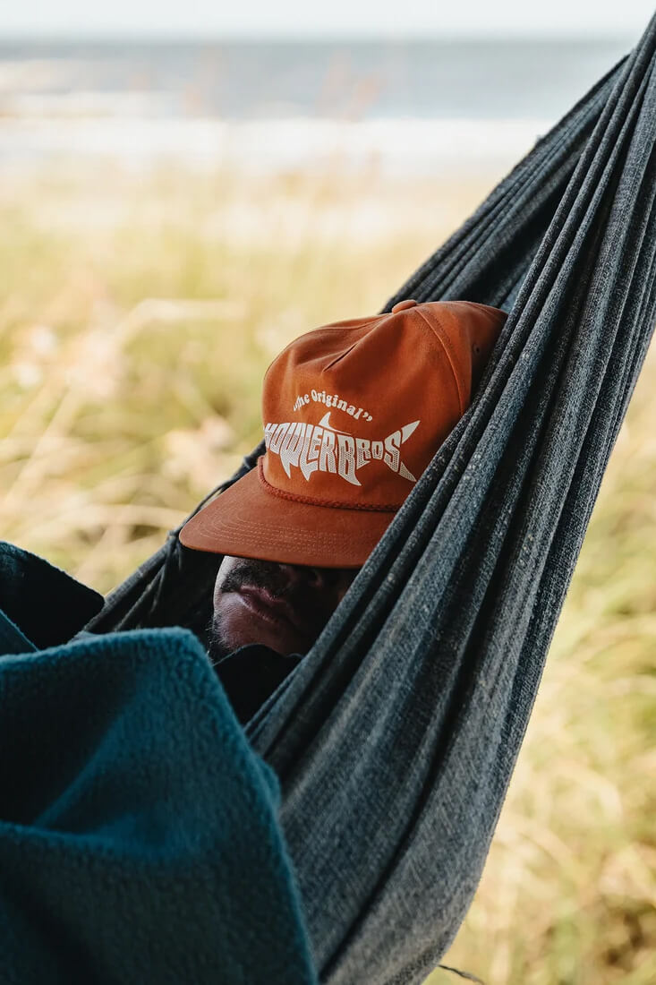 Howler Brothers Silver King Snapback men's unstructured five-panel cotton hat with fishing-inspired artwork and adjustable closure.