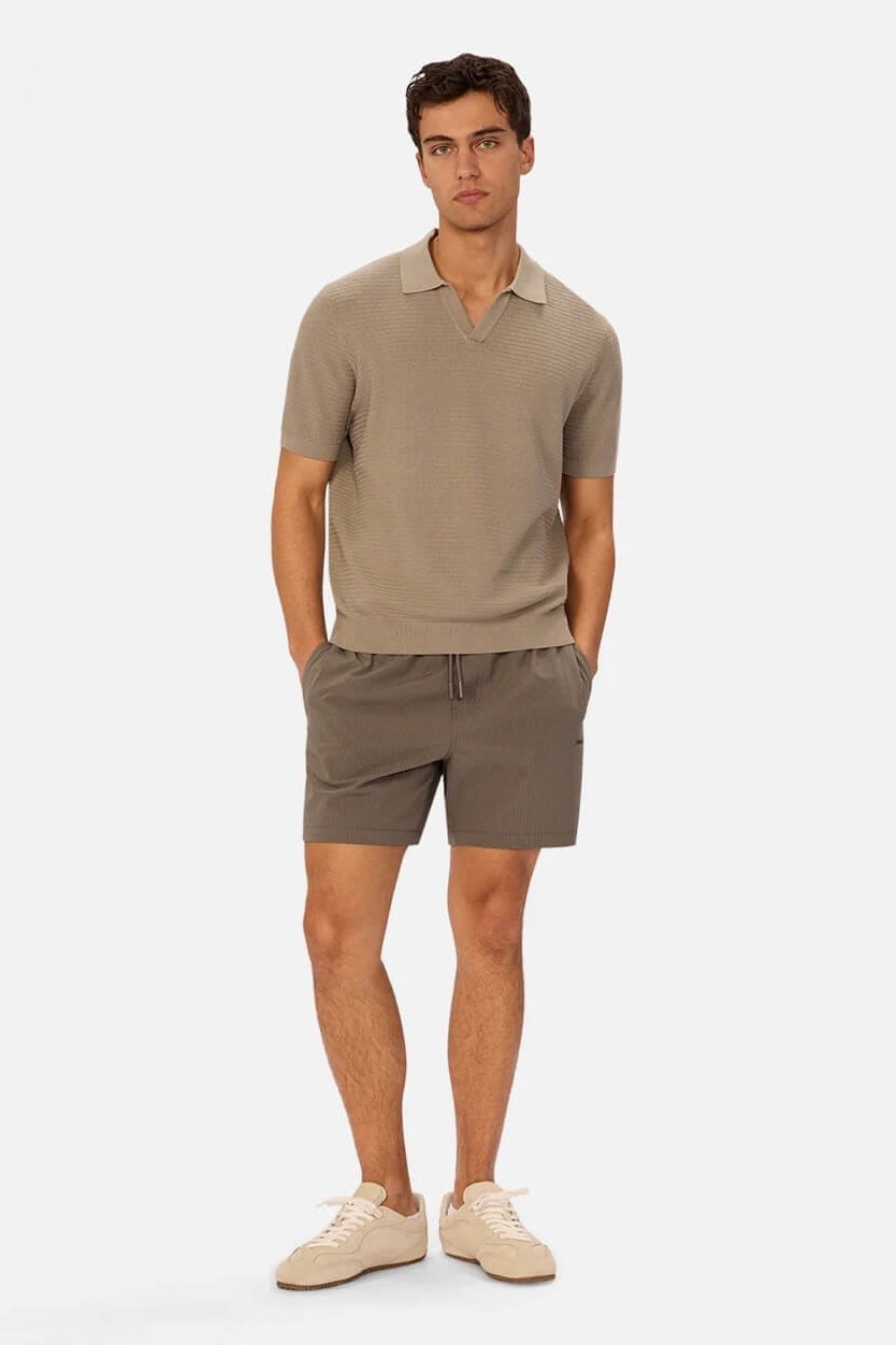 Man wearing The New Seersucker Swim Short in Oregano