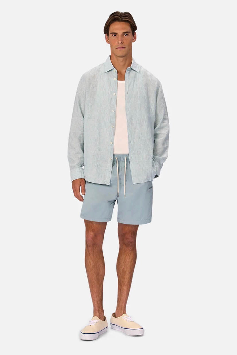 Man wearing The Avignon Long Sleeve Shirt in Mint/Turquoise
