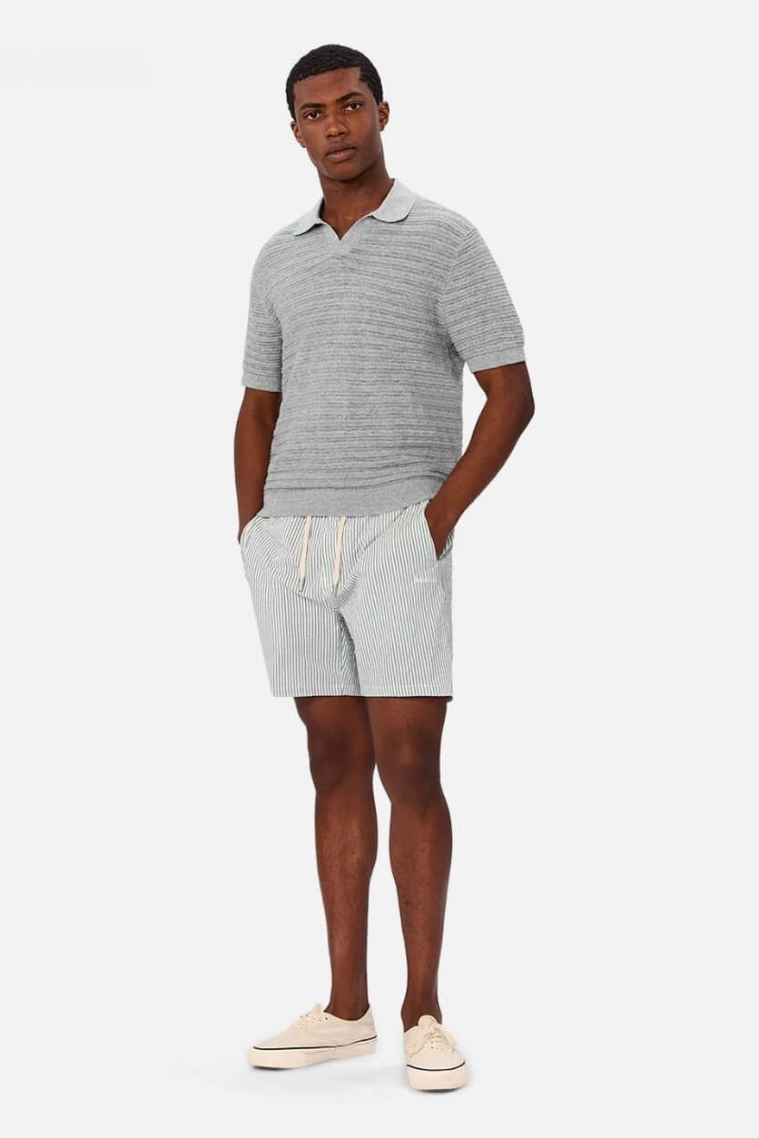 Man wearing The Bologna Polo in Ocean Marle