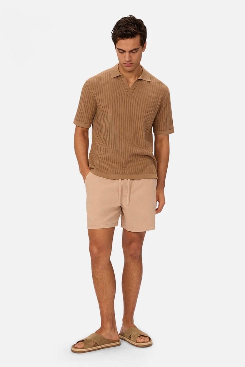 Man wearing The Mallorca Short in Lt Caramel by Industrie