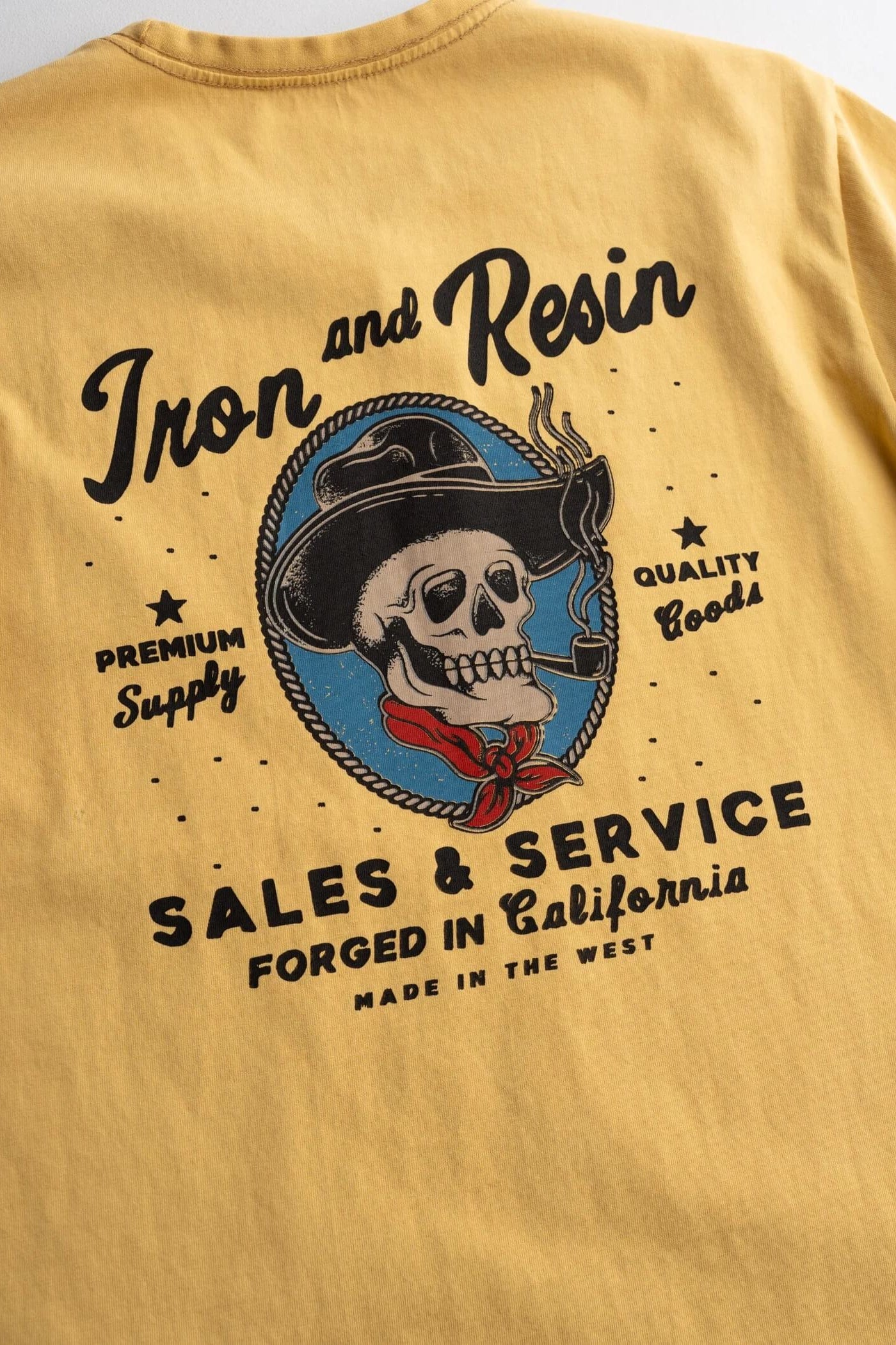 Iron & Resin Old Cowboy Pocket Tee in Gold graphic close up