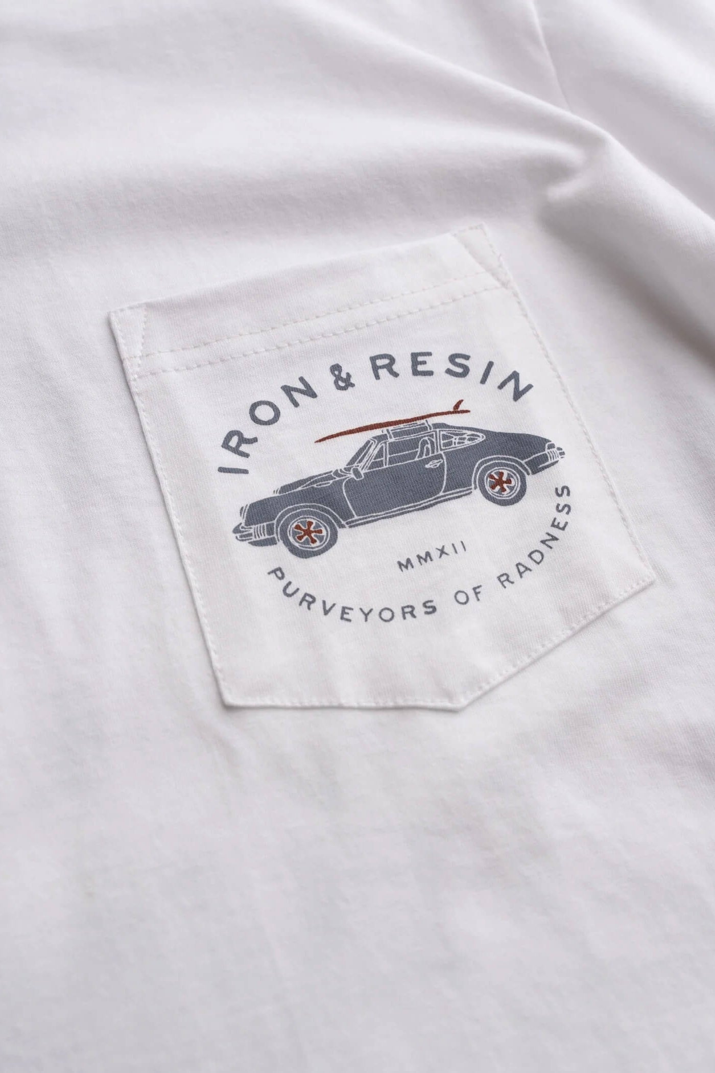 Iron & Resin Purveyors of Radness Pocket Tee in White front pocket