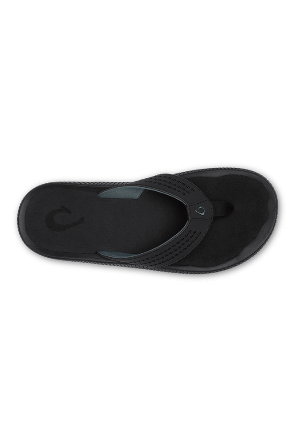 OluKai Ulele Sandal in lava rock