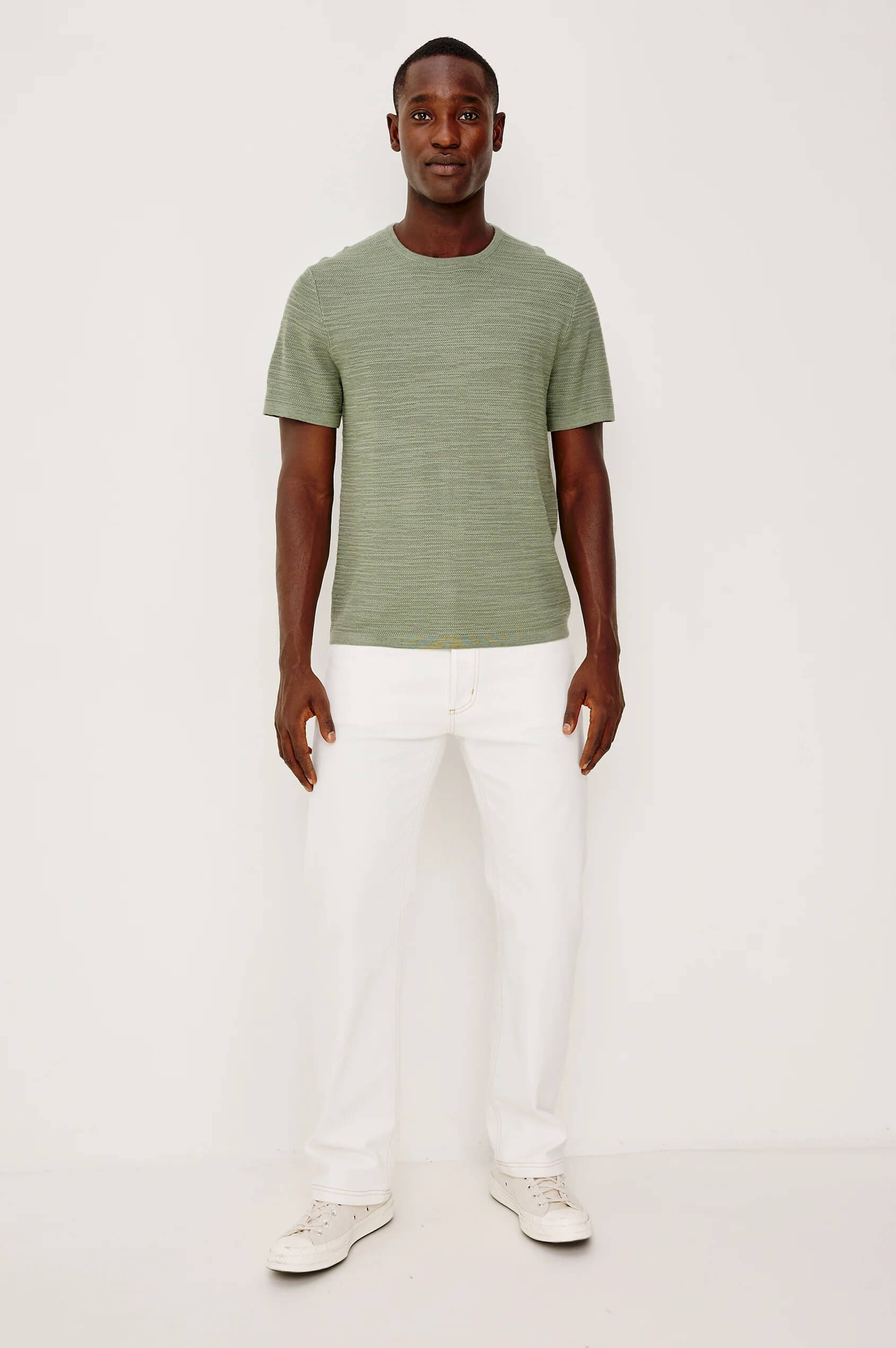 Model wearing the Rails Theo short sleeve sweater in Silver Sage
