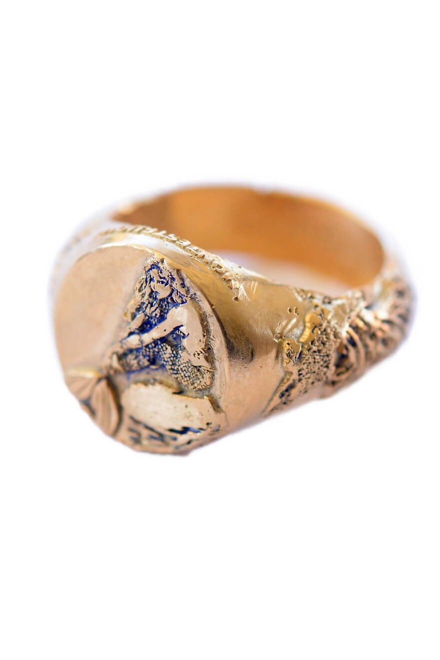 Montestruque mermaid ring. Bronze ring for men. Shop Montestruque jewelry today. Featuring handcrafted jewelry, historic jewelry styles, Sustainable Practices and a love of nature, shop medieval themed jewelry for men and women. Coin necklaces for women. Signet rings for men. Medieval jewelry for women. Medieval jewelry for men. Zodiac jewelry for women. Magic jewelry. Fantasy jewelry. Nature jewelry for women. Moon and stars jewelry. Unisex jewelry.