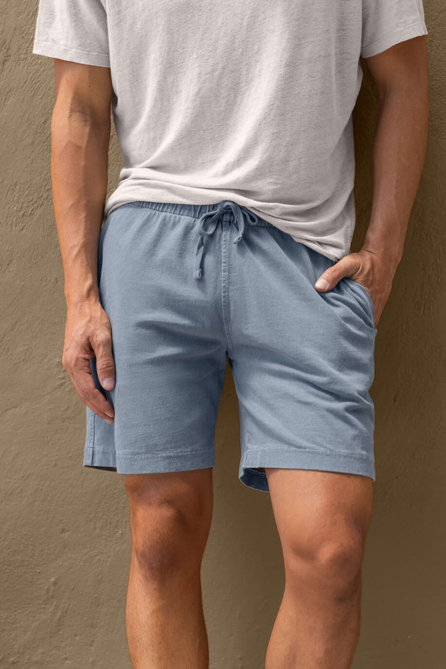 Man wearing Alex Crane Caza Knit shorts in wave