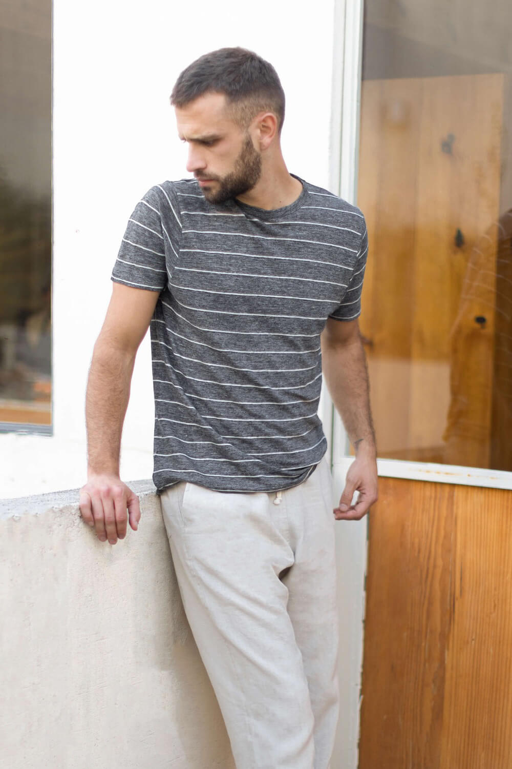 Man wearing the Alex Crane sun tee in chalk