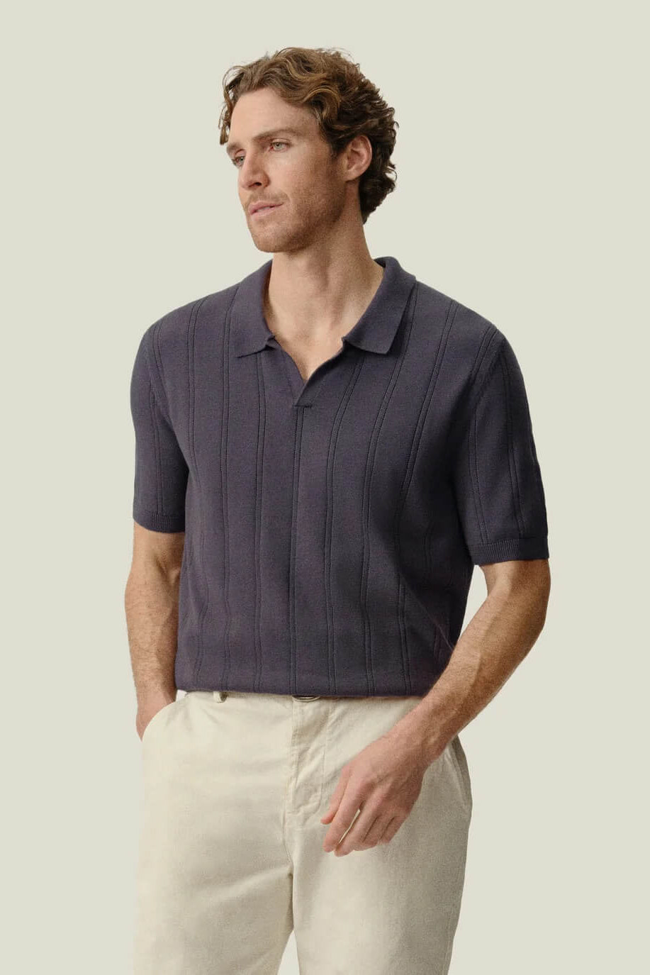 Man wearing the Alex Crane Lolo Drop Needle Sweater Polo in Ash