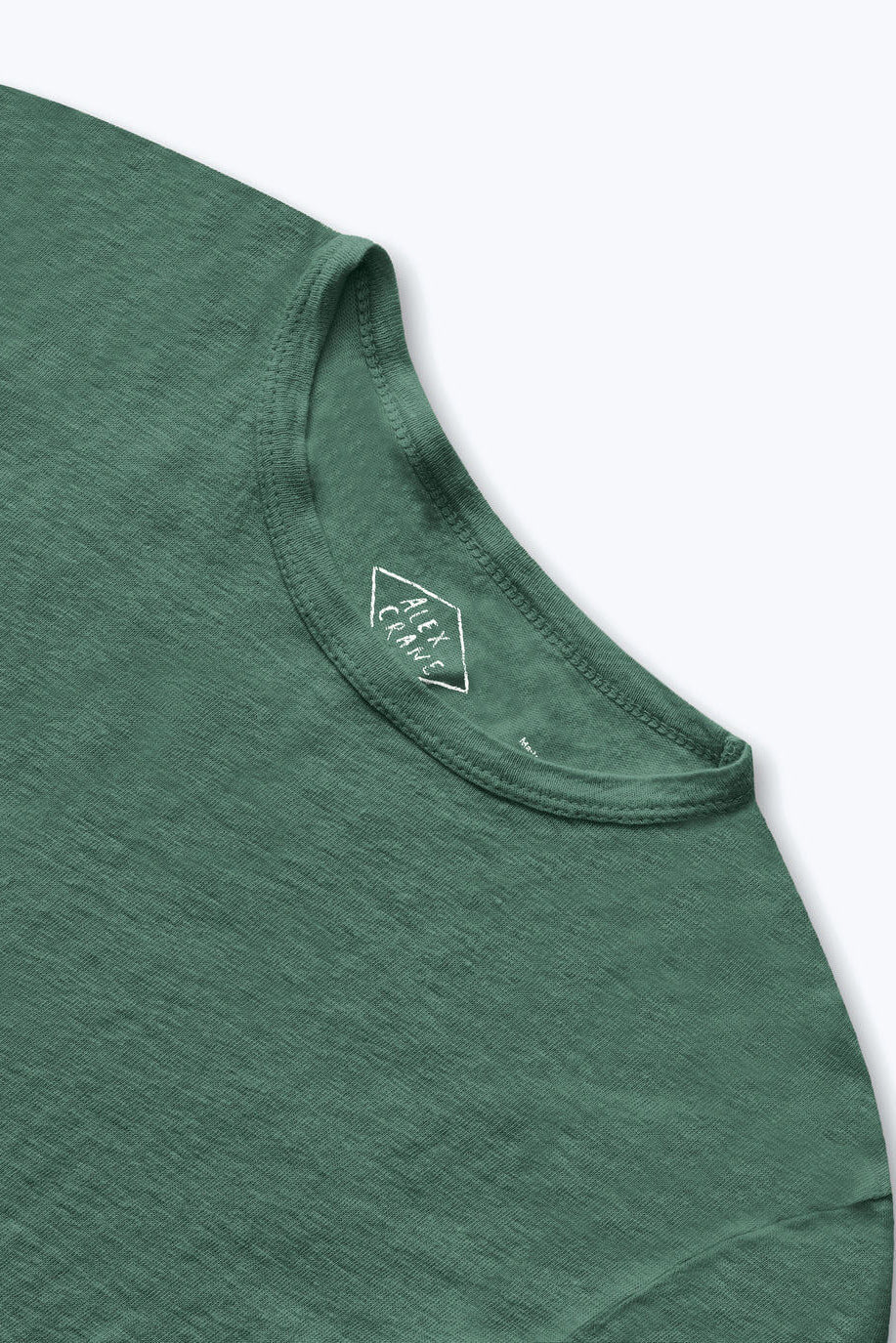 Alex Crane Sun Tee in Pine close up