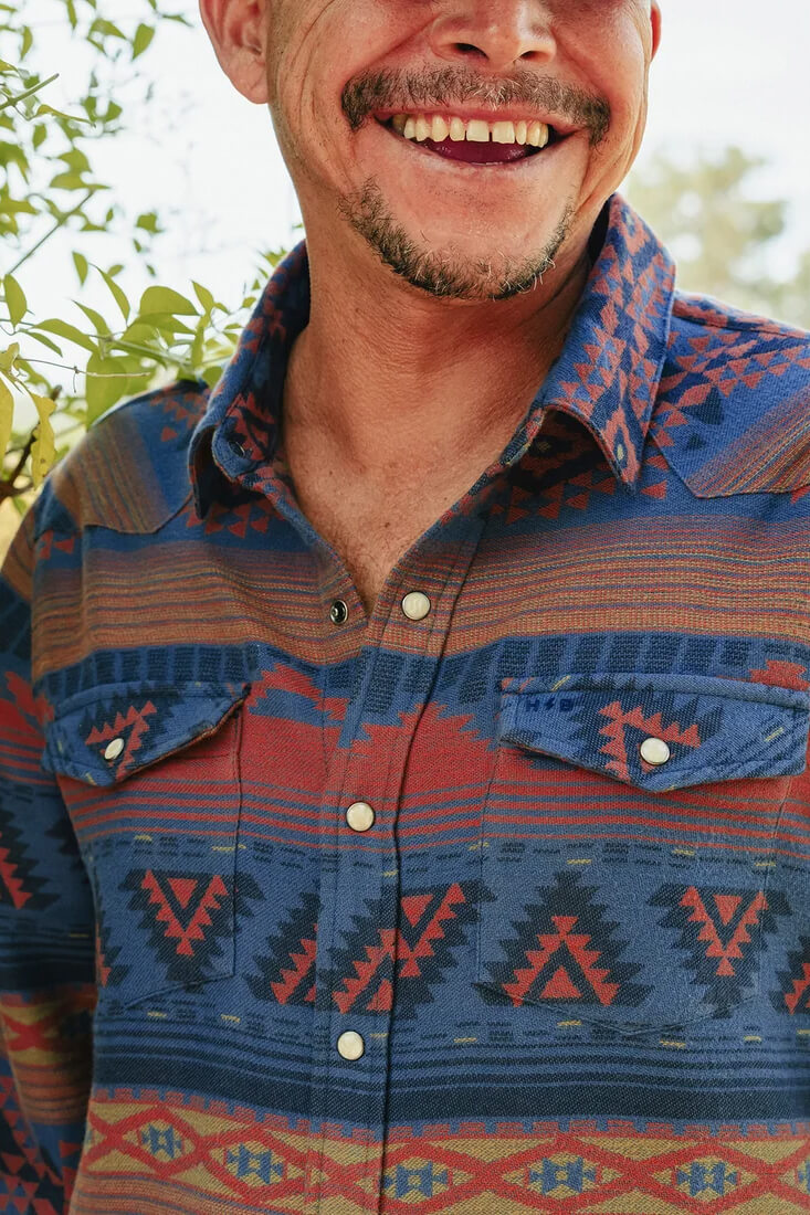 Howler Brothers Sheridan Flannel men's regular-fit jacquard flannel shirt with western-inspired styling, bone snaps, and shirttail hem.