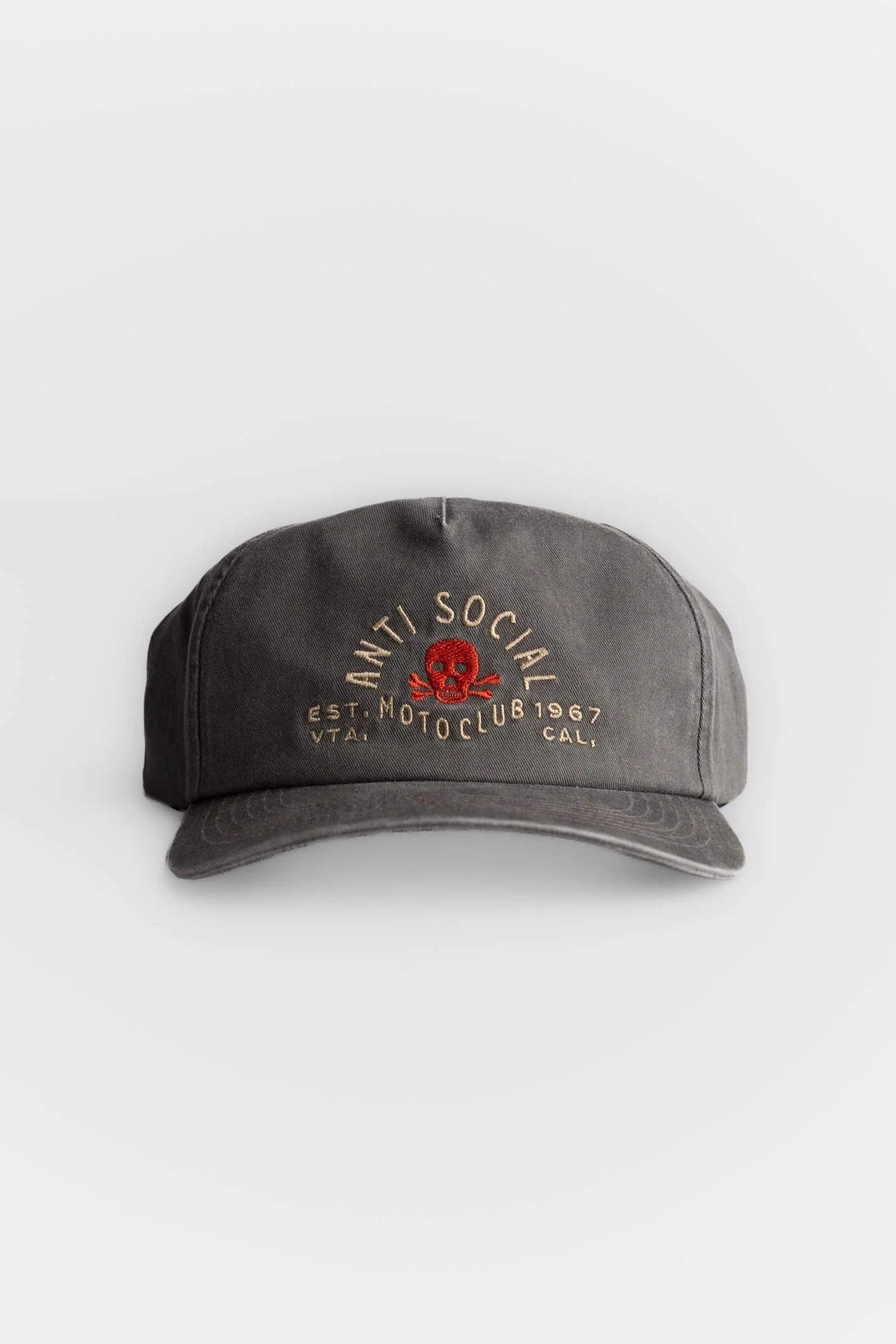 A dark gray washed baseball cap with embroidered text reading 'ANTI SOCIAL' and 'EST. MOTOCYCLE 1967 CAL.