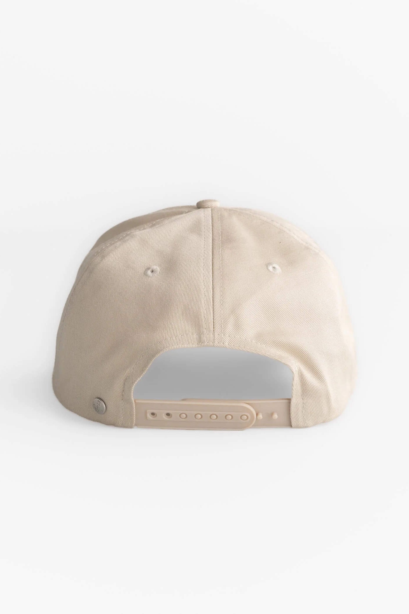 Beige baseball cap on a white background