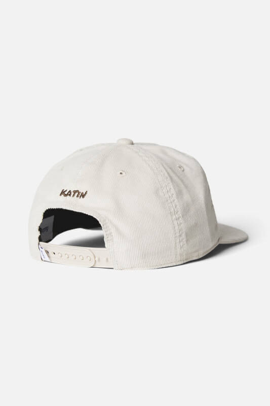 Katin Lumen Hat featuring cotton corduroy, custom embroidered graphics, a mid-crown five-panel design, flat brim, and adjustable snapback closure.