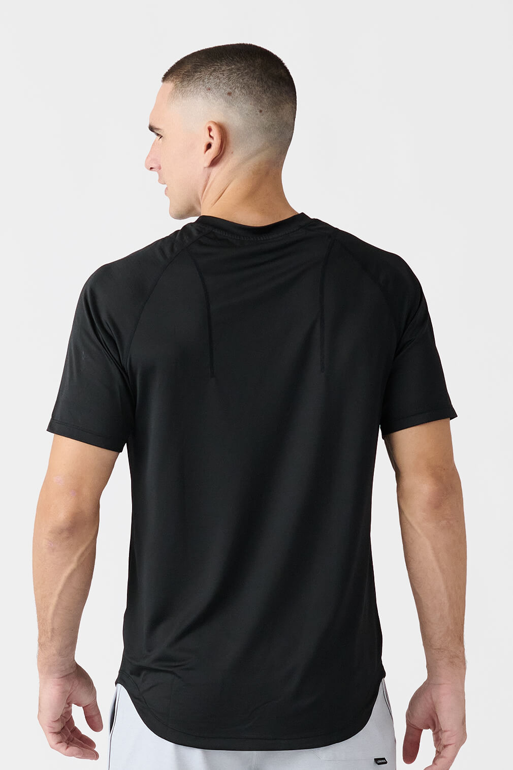 Legends Enzo Tee men's short sleeve performance shirt with athletic fit and scalloped hem