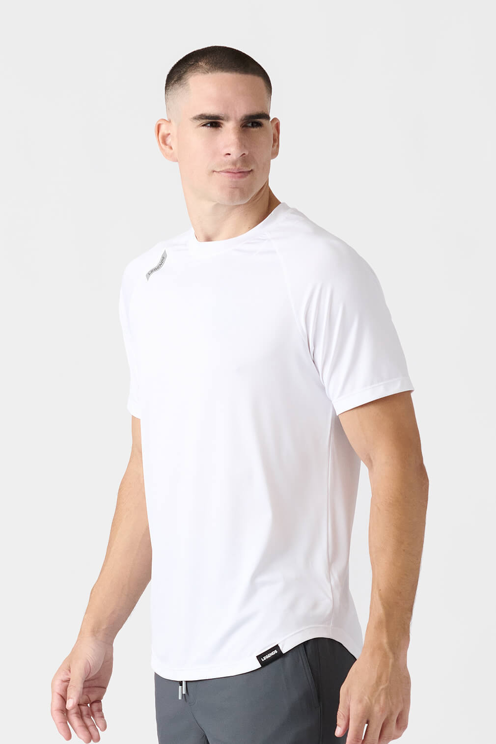 Legends Enzo Tee men's short sleeve performance shirt with athletic fit and scalloped hem