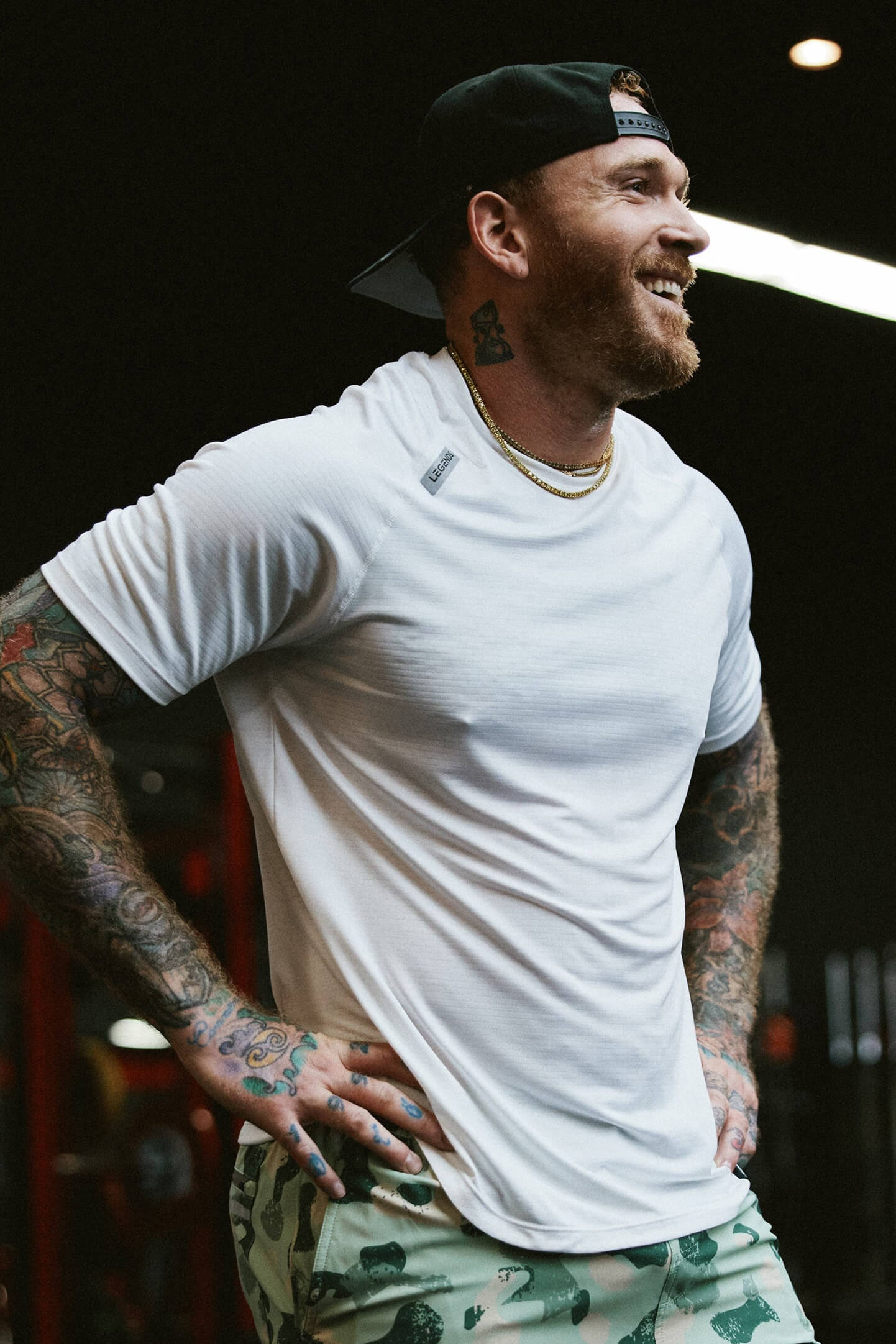 Legends Enzo Tee men's short sleeve performance shirt with athletic fit and scalloped hem