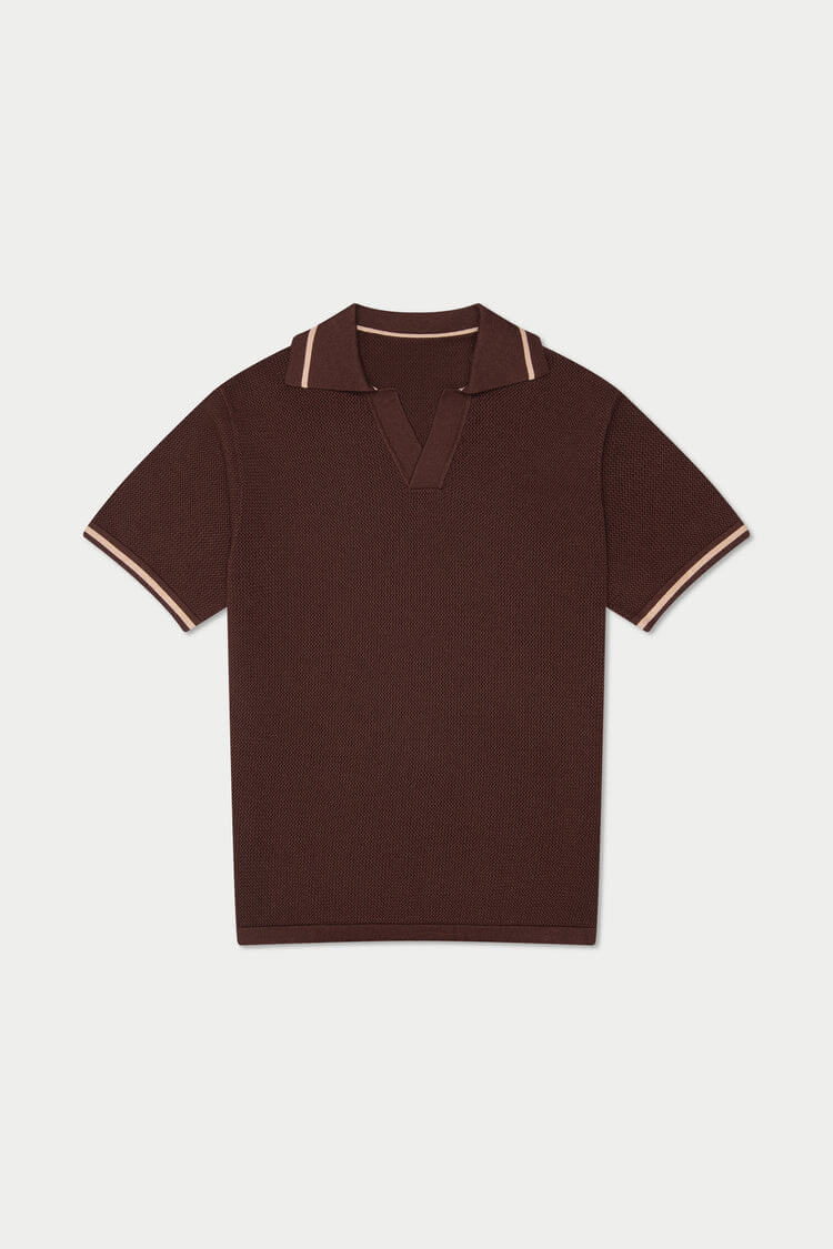 Brown polo shirt with white trim on a light gray background