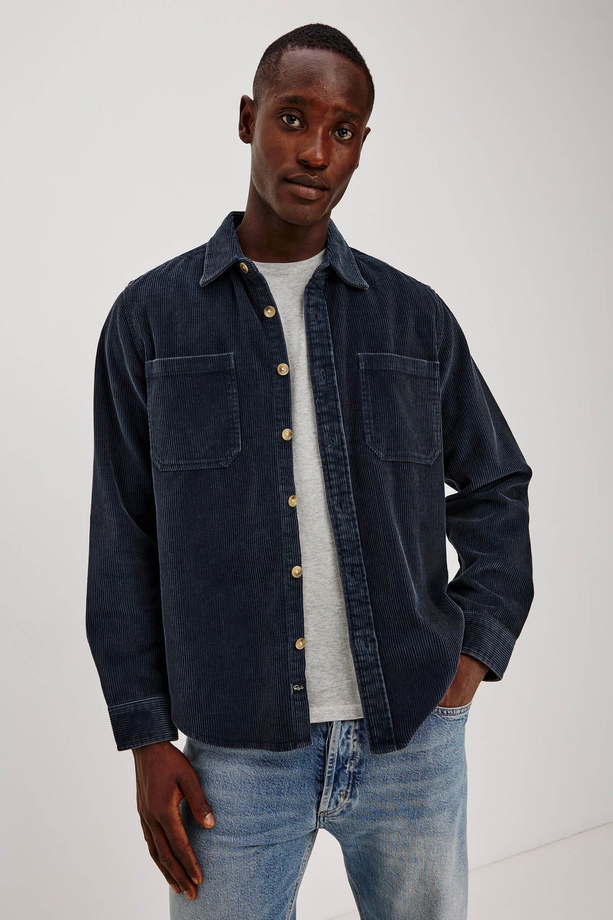 Rails Graham Overshirt in Midnight Blue featuring textured cotton corduroy, relaxed fit, classic collar, chest patch pocket, and button-front closure.