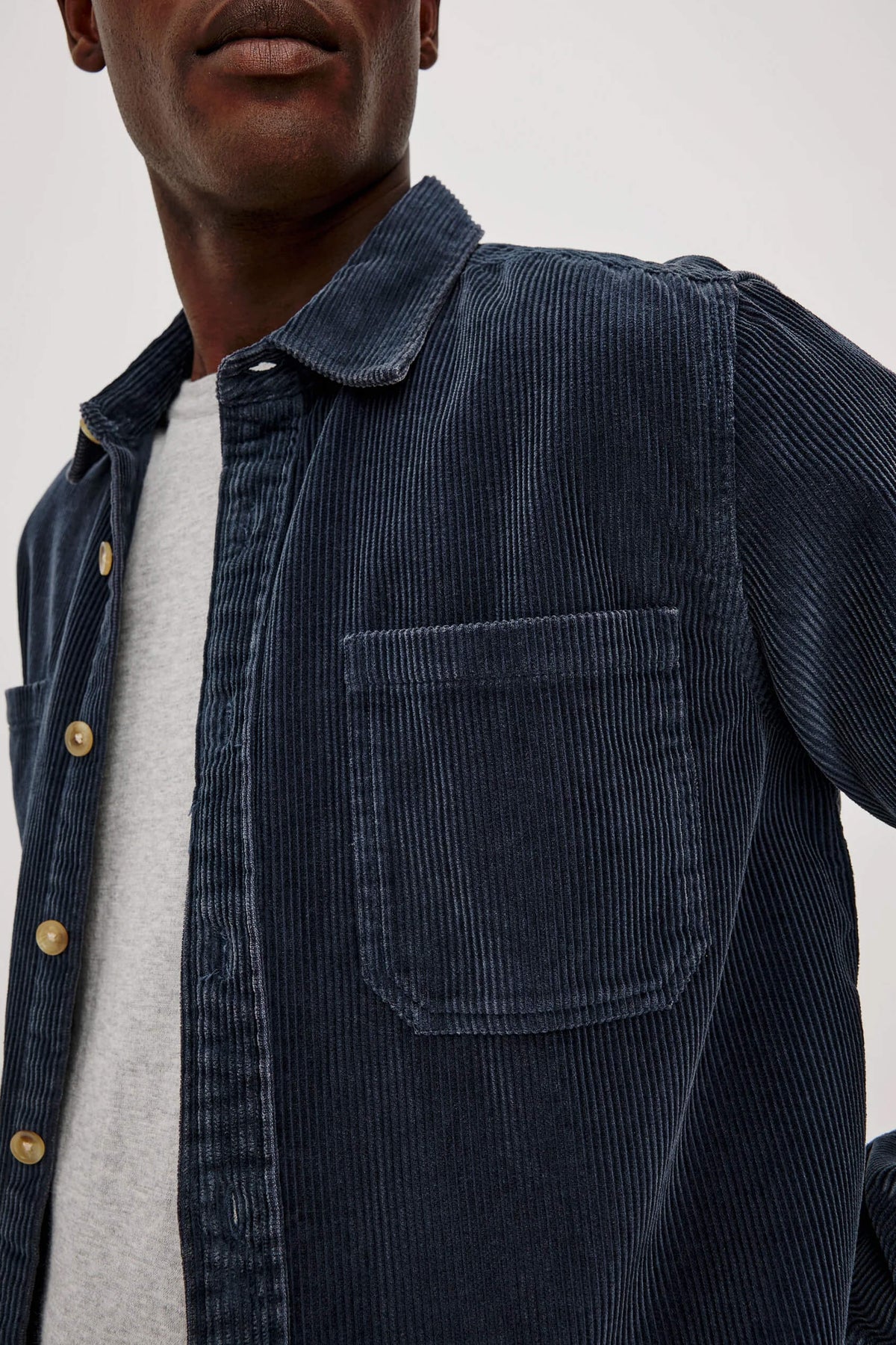 Rails Graham Overshirt in Midnight Blue featuring textured cotton corduroy, relaxed fit, classic collar, chest patch pocket, and button-front closure.