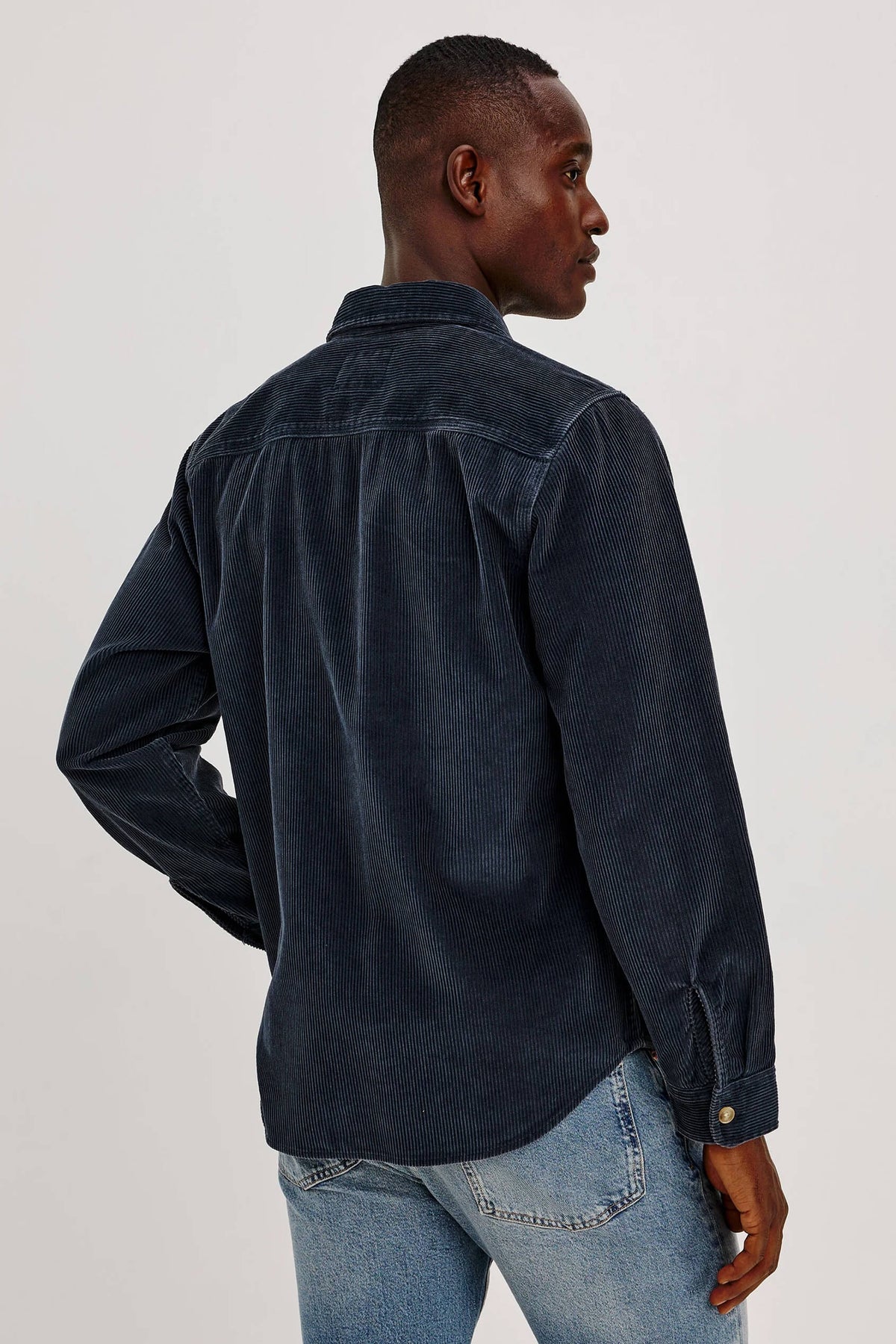 Rails Graham Overshirt in Midnight Blue featuring textured cotton corduroy, relaxed fit, classic collar, chest patch pocket, and button-front closure.