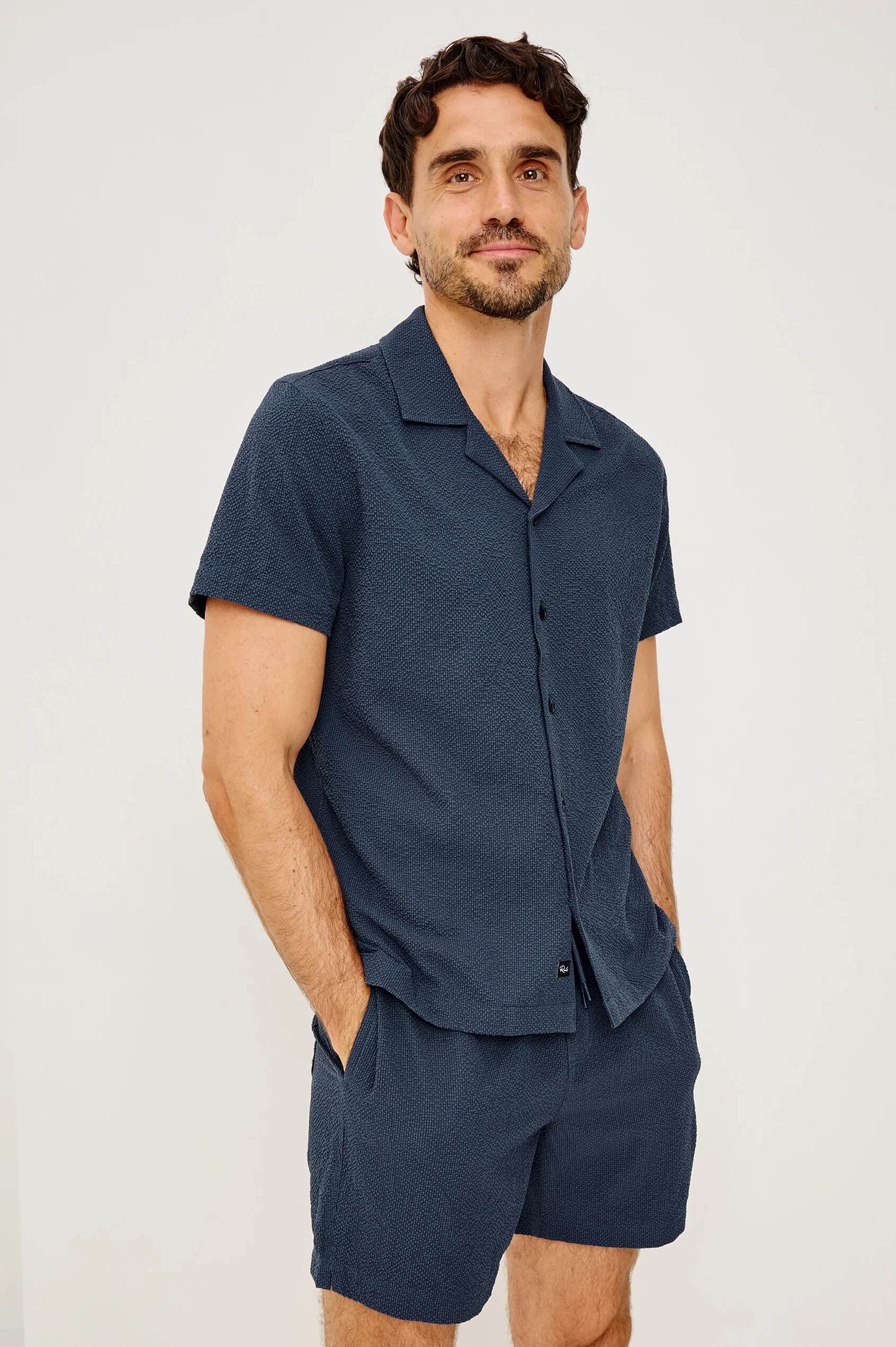 Model wearing La Brea swim short in Stratos by Rails