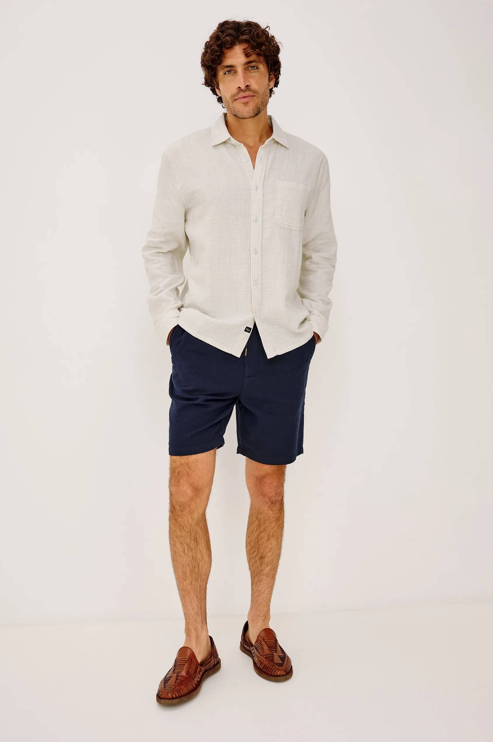 Man wearing the Owens shirt in Dune Reed by Rails