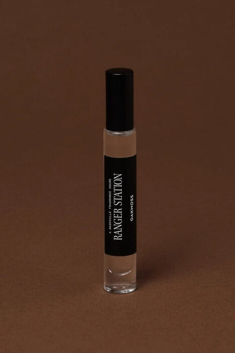 Ranger Station Oakmoss Perfume unisex woody fragrance with moss, cedarwood, amber and bergamot notes, available in Quickdraw rollerball and spray sizes.