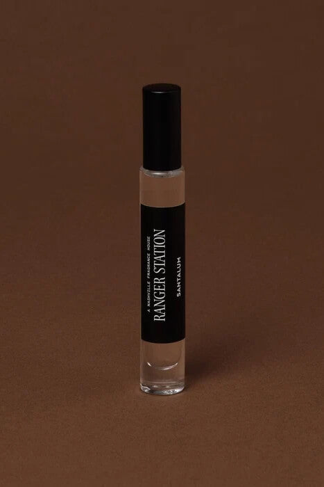 Ranger Station Santalum Perfume unisex sandalwood fragrance available in 10ml Quickdraw rollerball, 50ml and 100ml sizes.