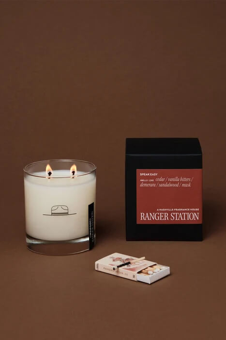 Ranger Station Speak Easy Candle 8 oz. soy wax blend candle with cedar, vanilla bitters, demerara, sandalwood and musk fragrance notes.