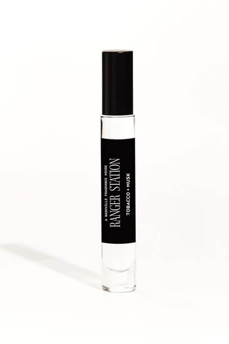 Ranger Station Tobac + Musk Perfume with sweet pipe tobacco, blue musk, clove and amber notes, available in Quickdraw rollerball and spray sizes.