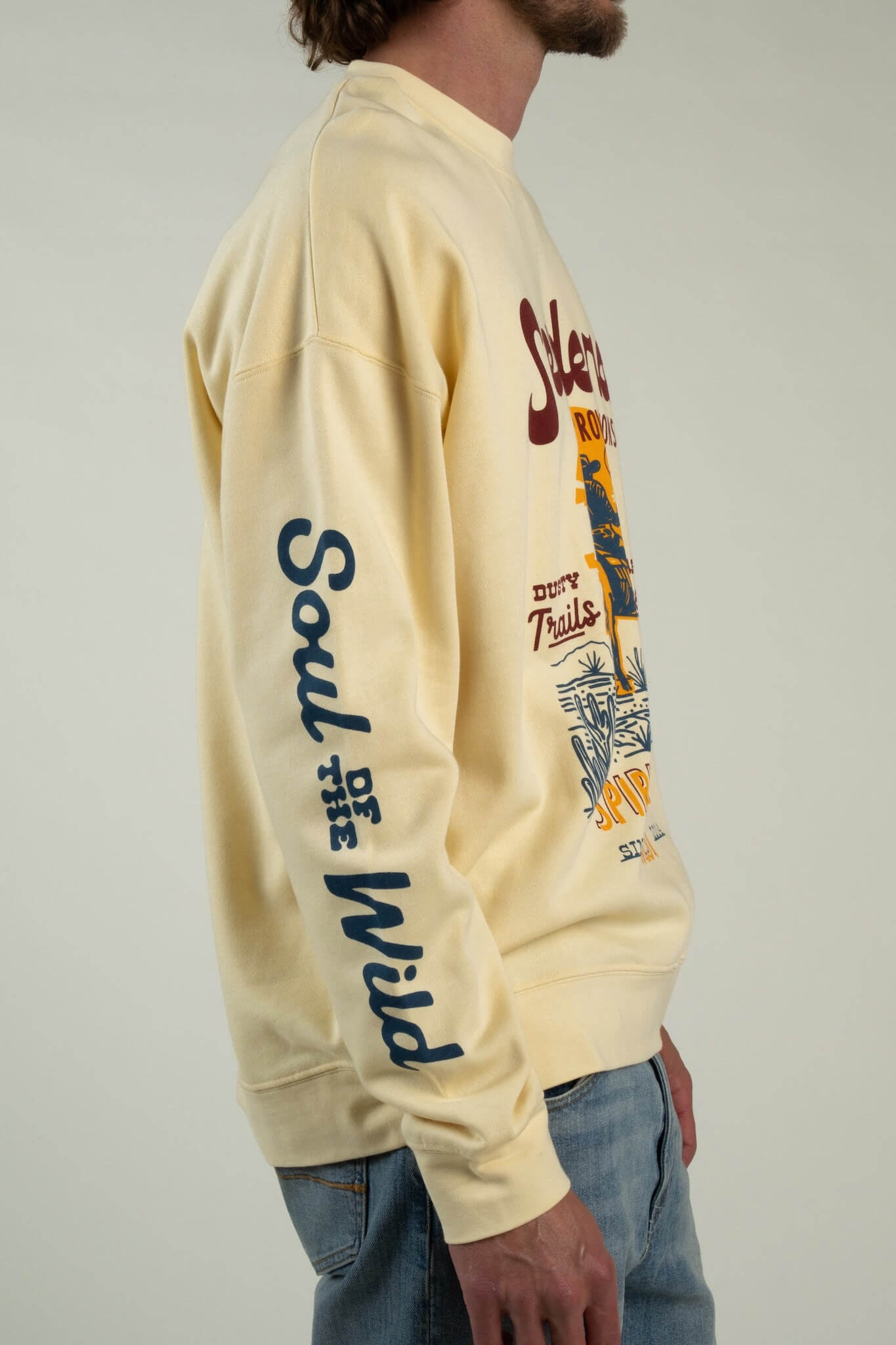 Sendero Provisions Co. Dusty Trails men's graphic crewneck sweatshirt with Western-inspired artwork.