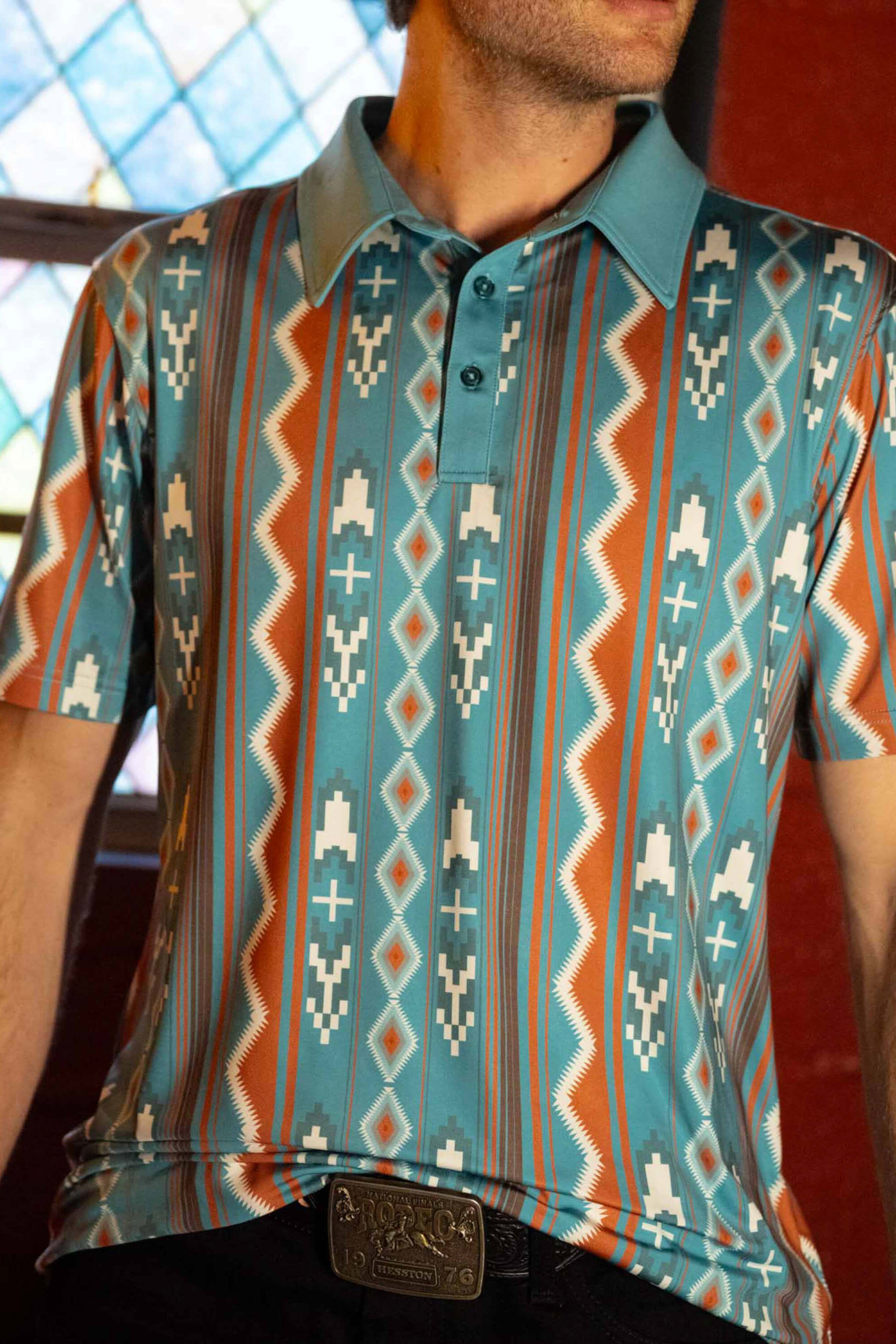 High Noon Performance Polo by Sendero  in nogales stripe  lifestyle 