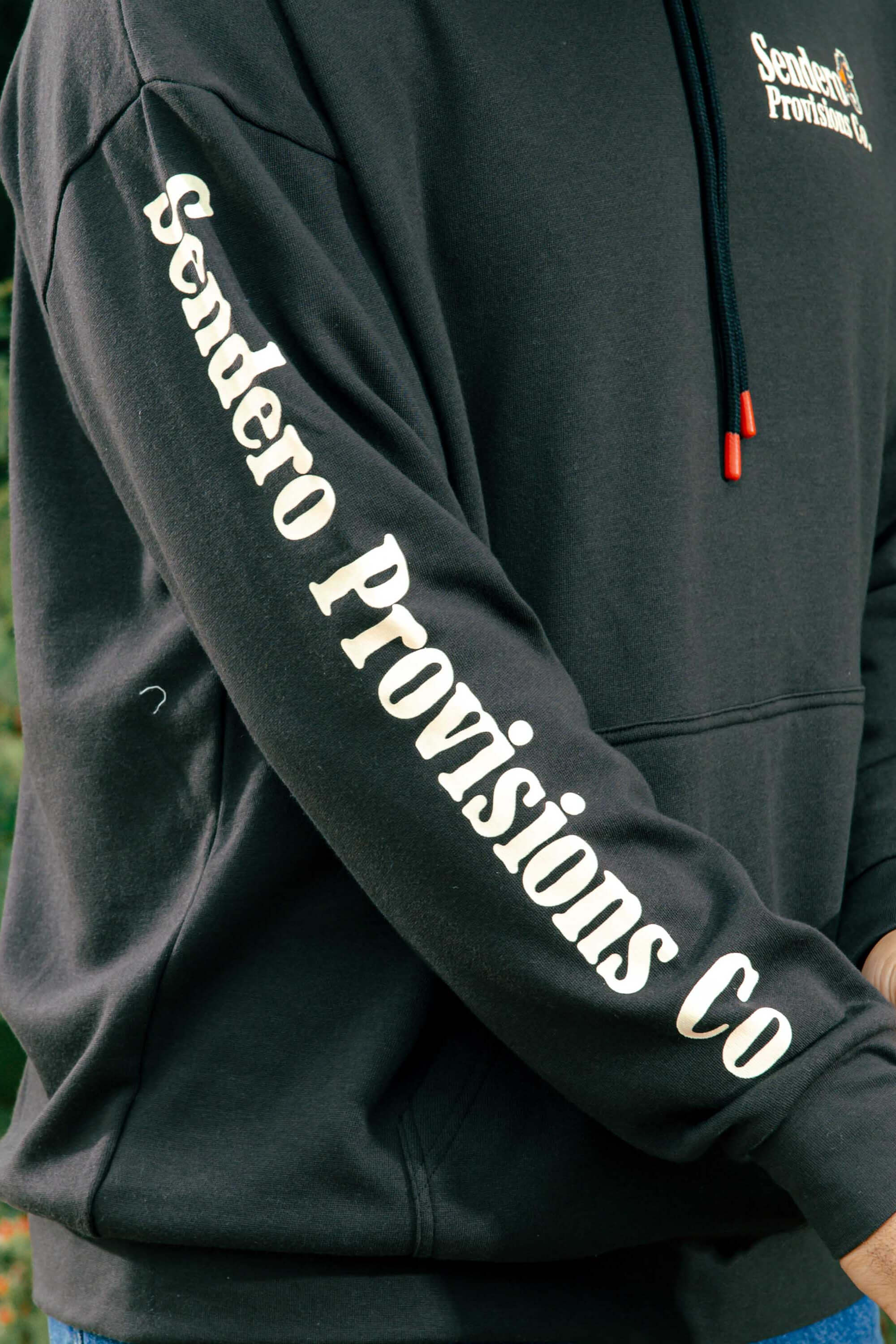 Sendero Provisions Co. Monanatana men's graphic hoodie with Western-inspired artwork and classic pullover design.