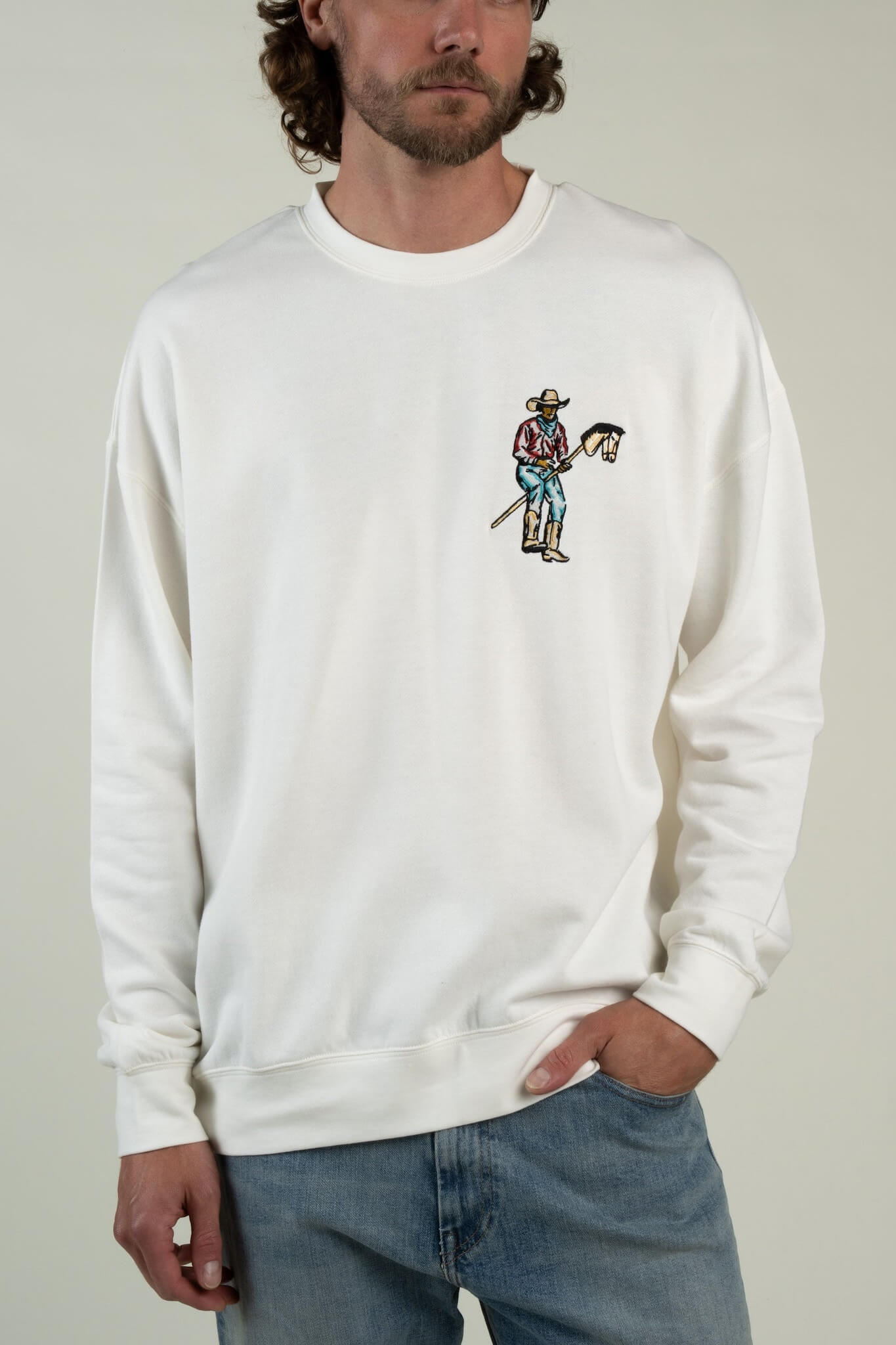 Sendero Provisions Co. Stick Horse men's graphic crewneck sweatshirt with Western-inspired artwork.